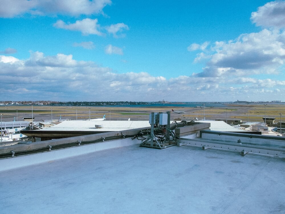 A view of communication equipment on a building at Logan airport